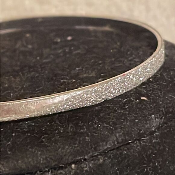 7.5” silver tone textured and smooth polished bangle bracelet - Picture 2 of 10